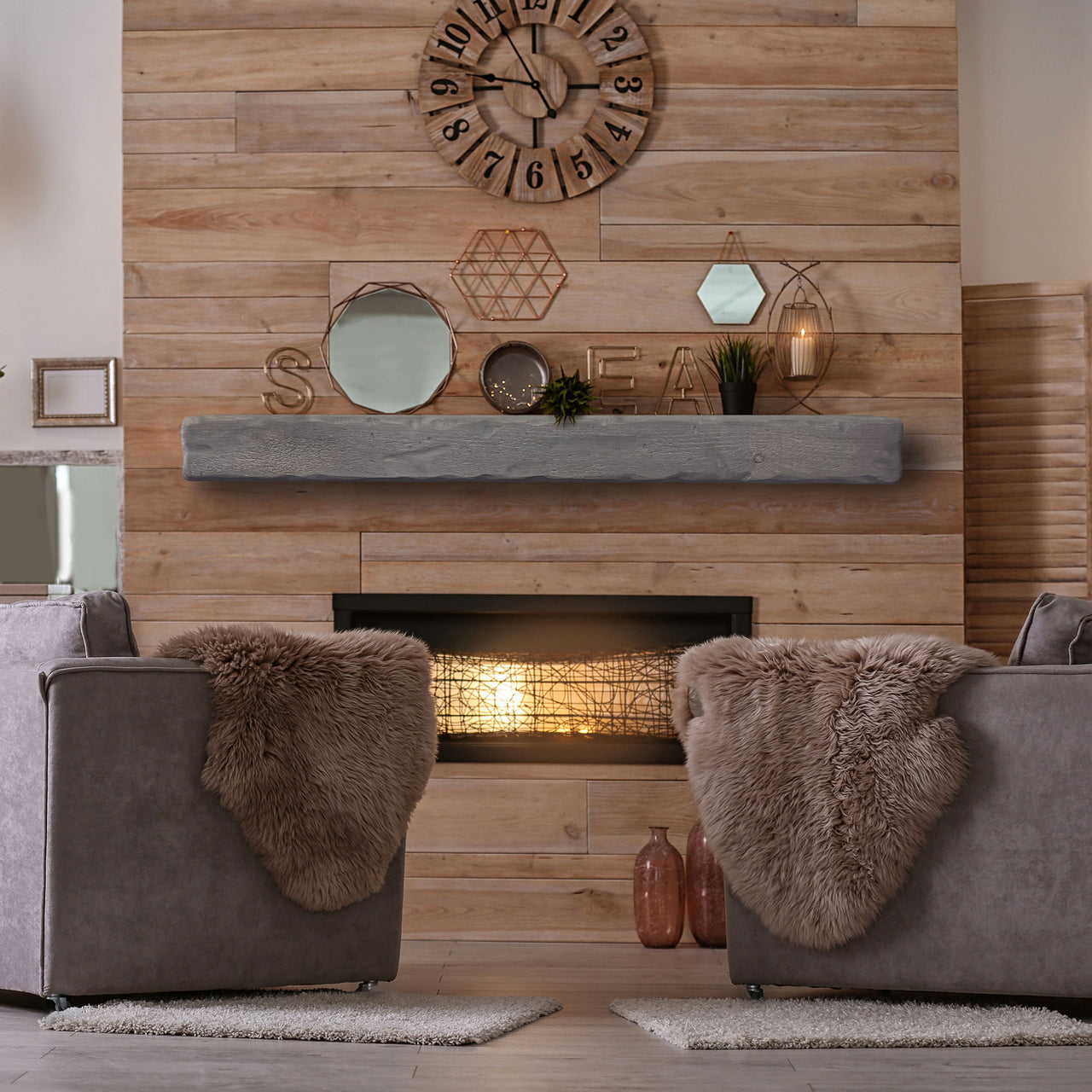 A grey rustic floating matel installed on a reclaimed wood wall. 